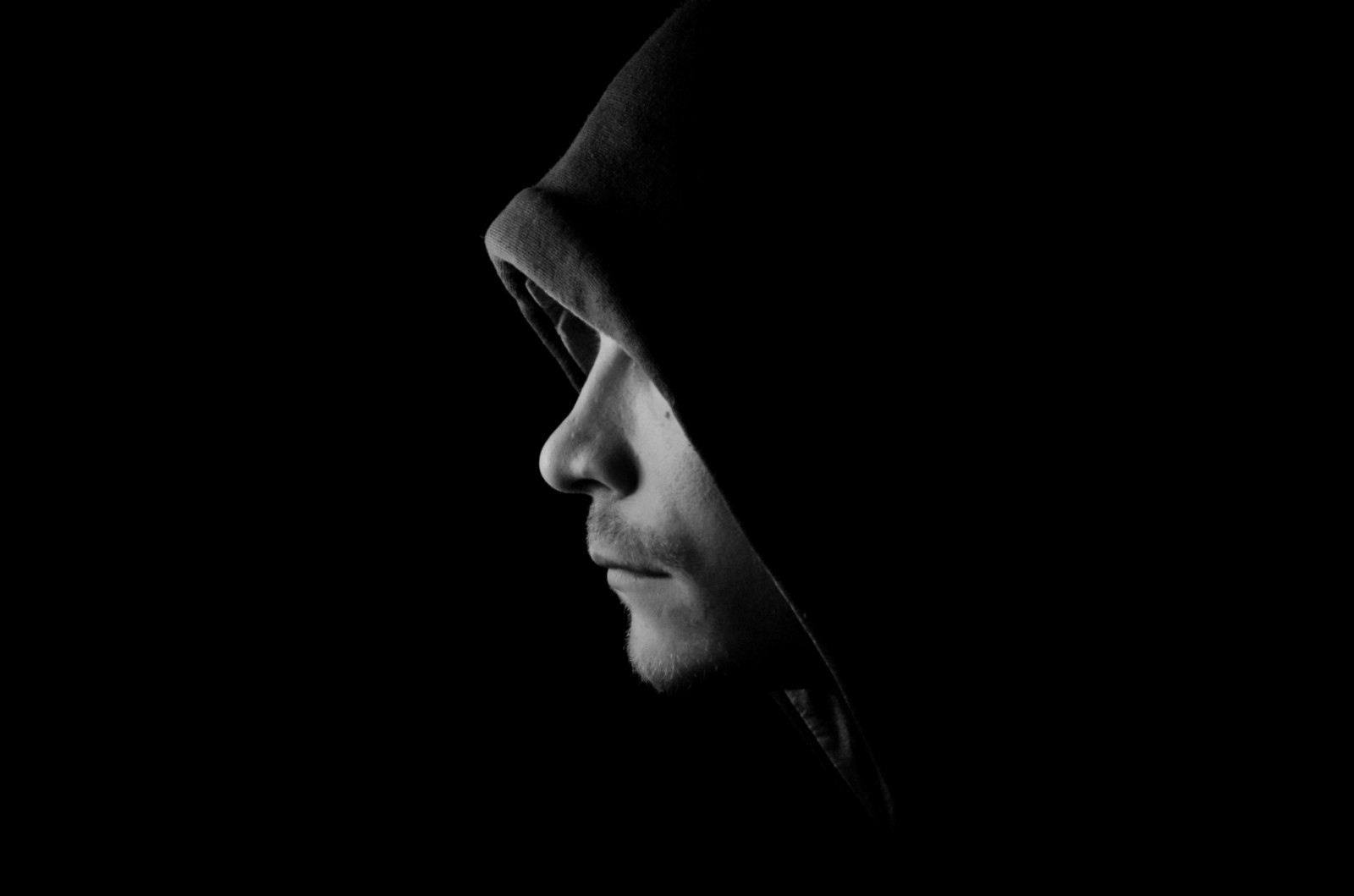 man hiding in shadows skin